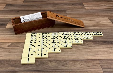 dominoes game in wooden box